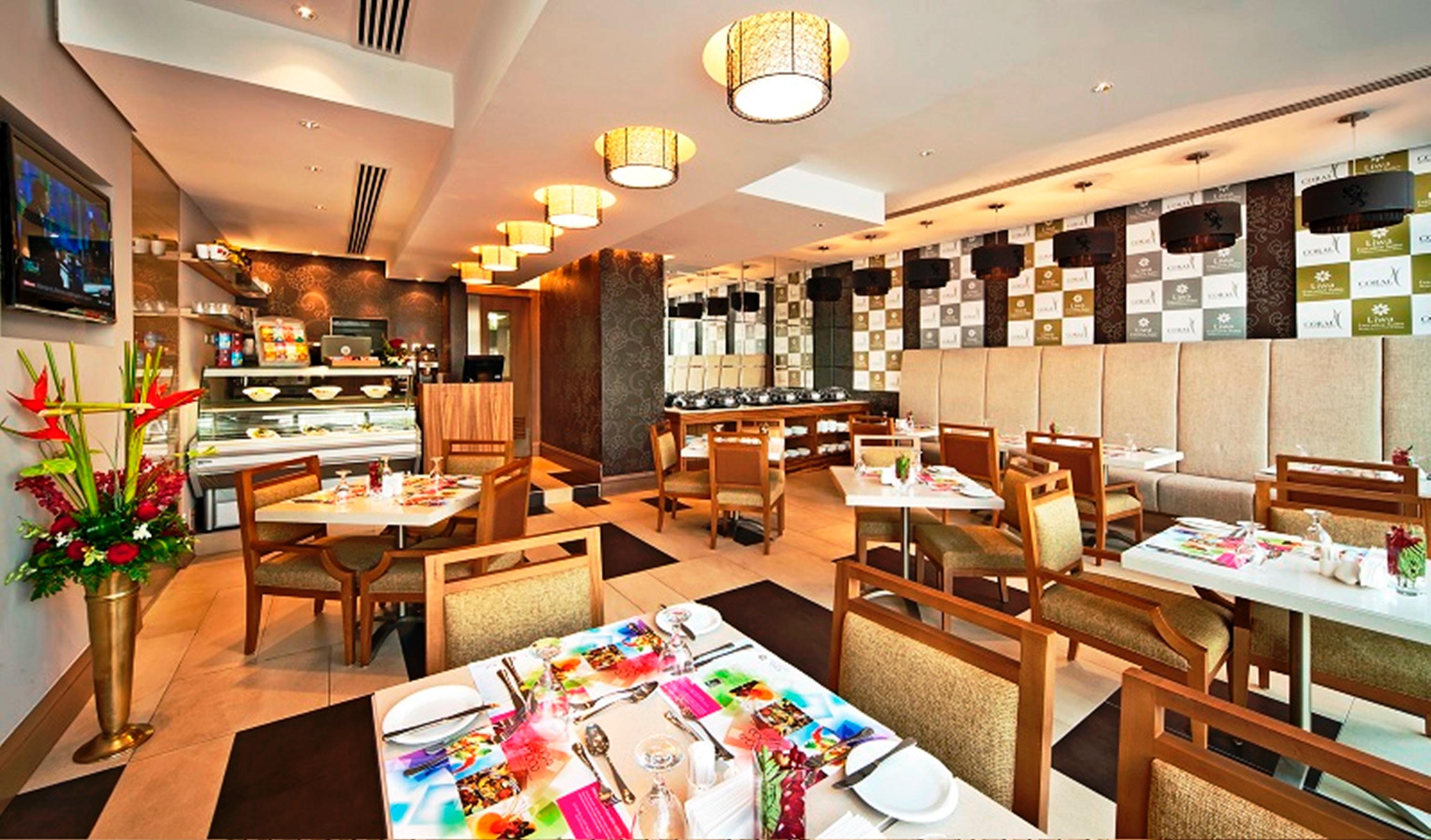 Oaks Liwa Executive Suites Abu Dabi Restaurante foto